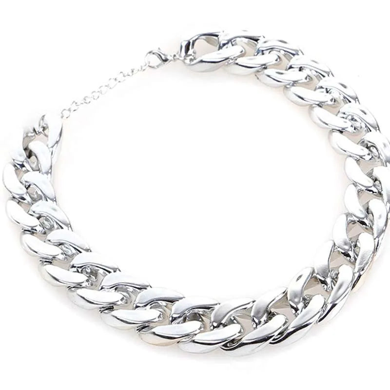Geometric twisted chain dog collar in gold colour with plastic/resin construction for small-medium pets