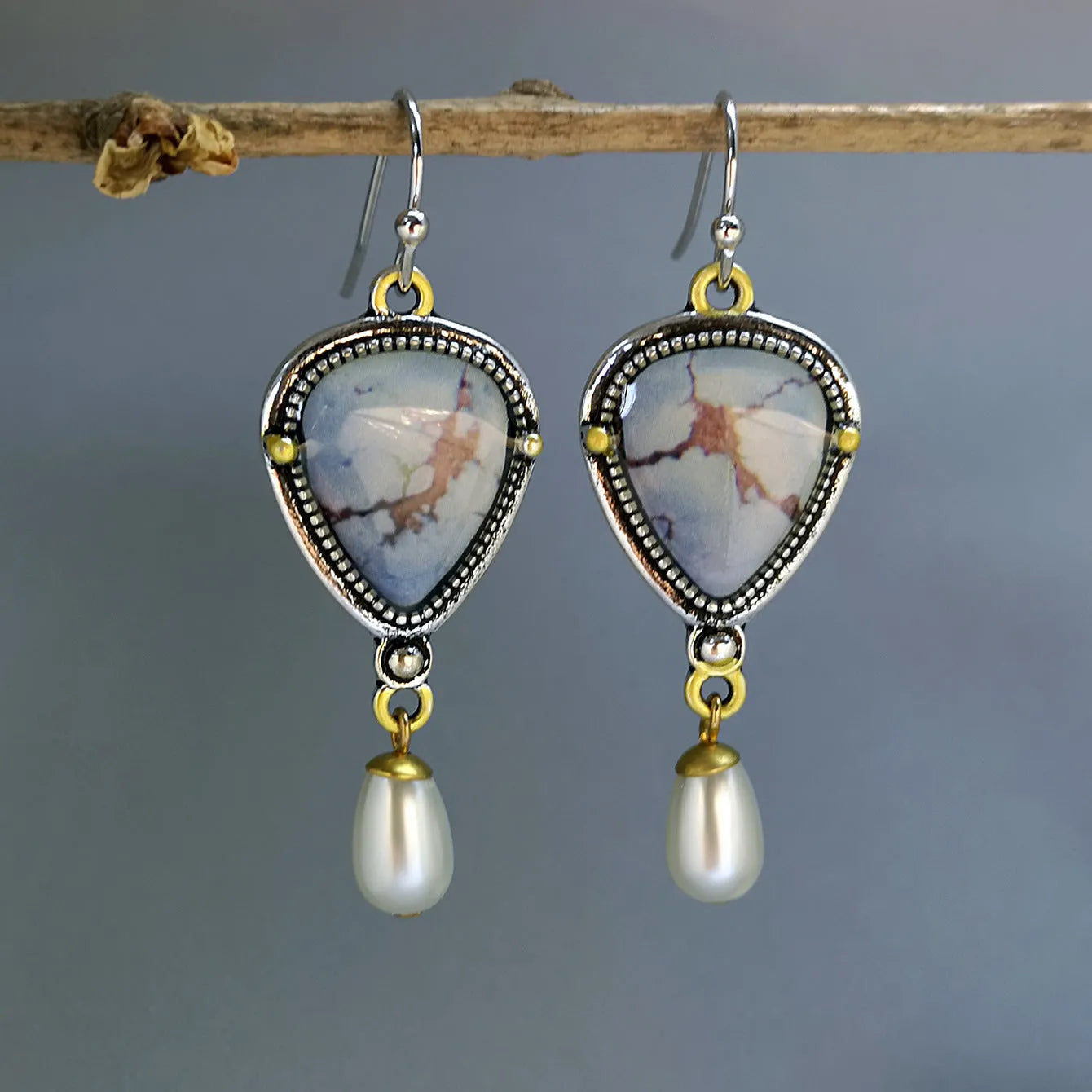 Retro blue drop earrings with electroplated metal, synthetic blue opal, and white pearl geometric design