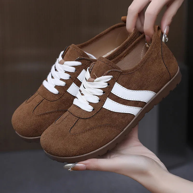 Women's vintage-style canvas sneakers with round toe and flat rubber sole in dark red colour