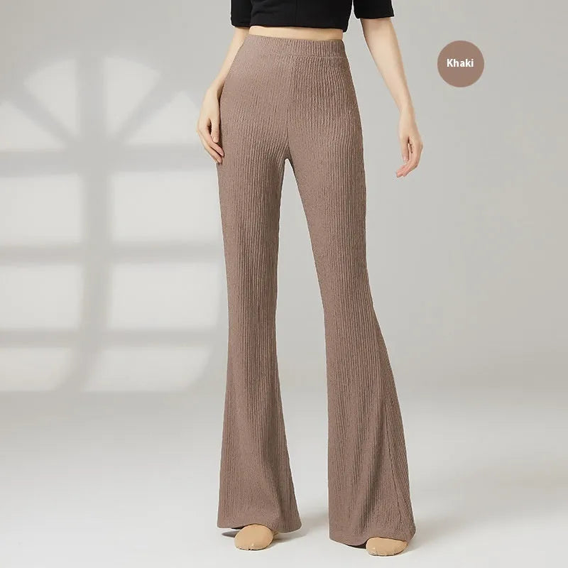 Women's solid colour dance practice trousers in polyester fabric for ballet training.