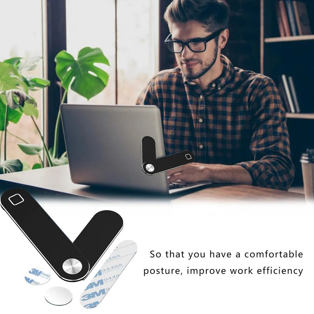 Black aluminium laptop phone holder with magnetic mount attached to laptop showing dual screen setup