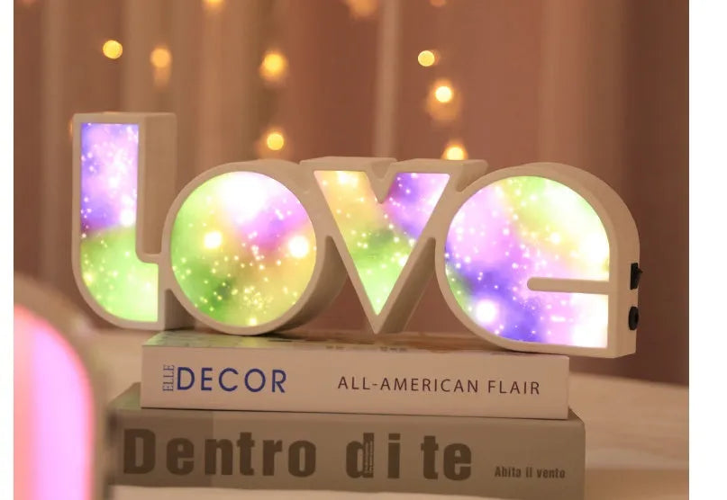 Rainbow coloured LED decorative light spelling LOVE, with USB cable.