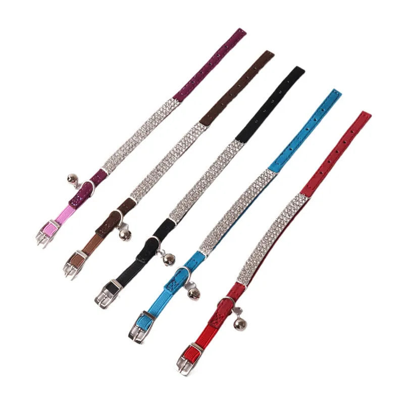 Colourful flocked cat collar with elastic buckle in pink, black, red, blue, purple, and dark brown options.
