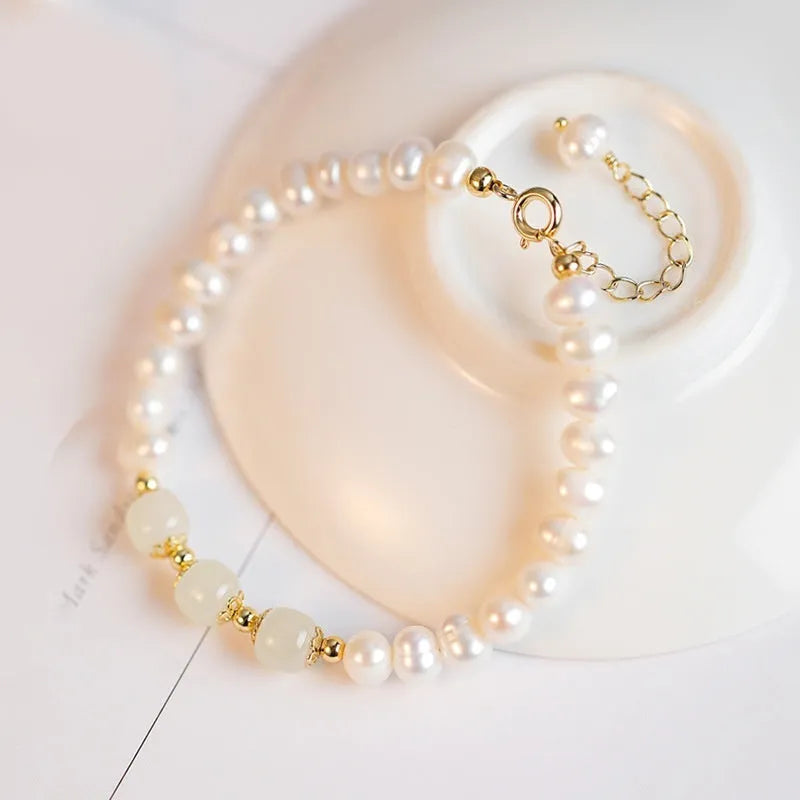 Korean style freshwater pearl bracelet with diamond-shaped electroplated pearls in Hetian jade colour.