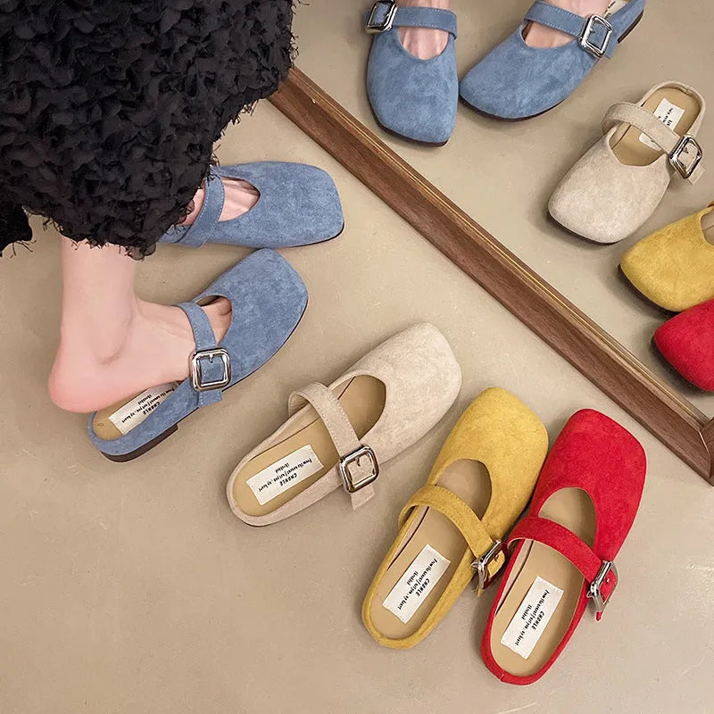 Women's flat closed toe slippers in apricot colour with a square toe and rubber sole.