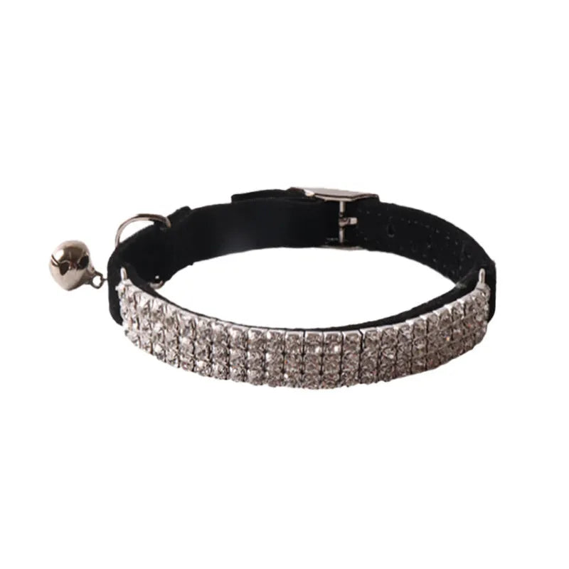 Colourful flocked cat collar with elastic buckle in pink, black, red, blue, purple, and dark brown options.
