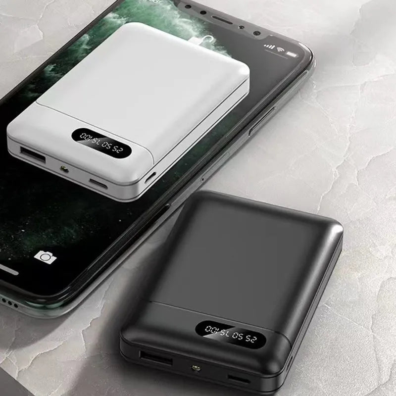Black and white portable power bank with multi-U charging ports for smartphones and tablets