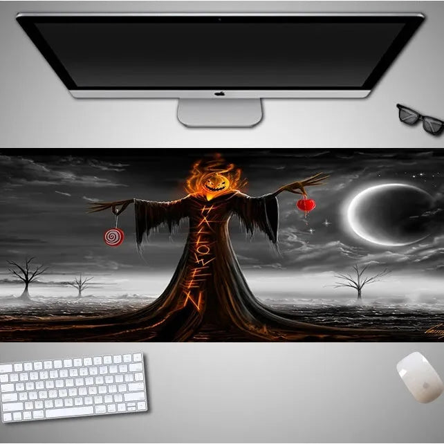 Large Halloween-themed computer mouse pad with graphic design on a desk