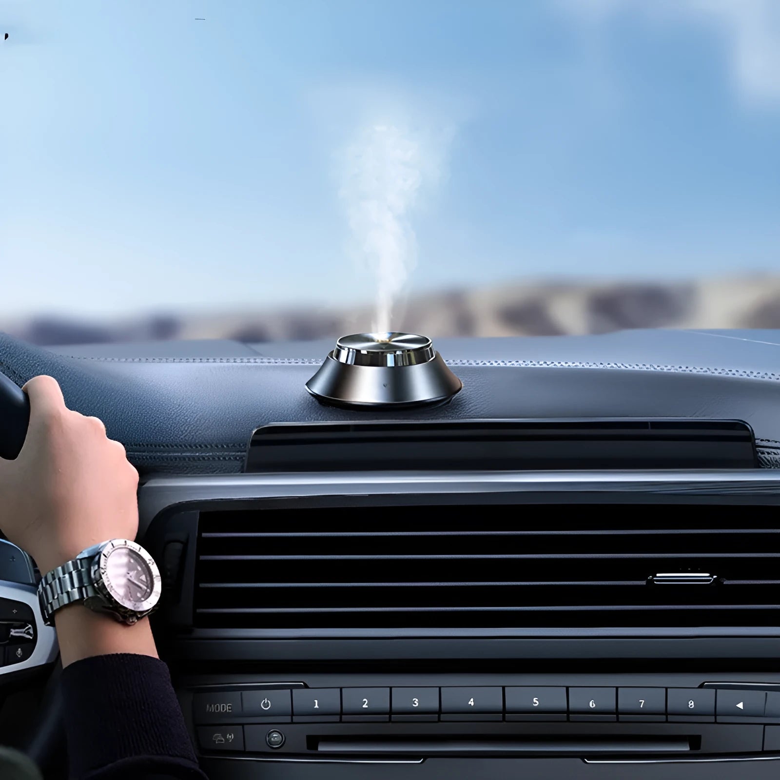 Black metal butterfly-design car aromatherapy unit with USB cable and 50ml essential oil bottle