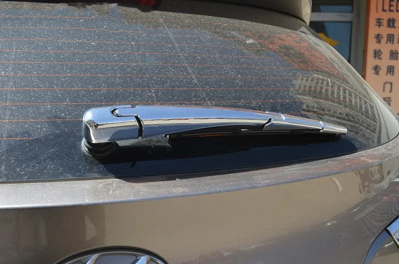 Set of four silvery ABS plastic rear window wiper trim covers for a Hyundai car.