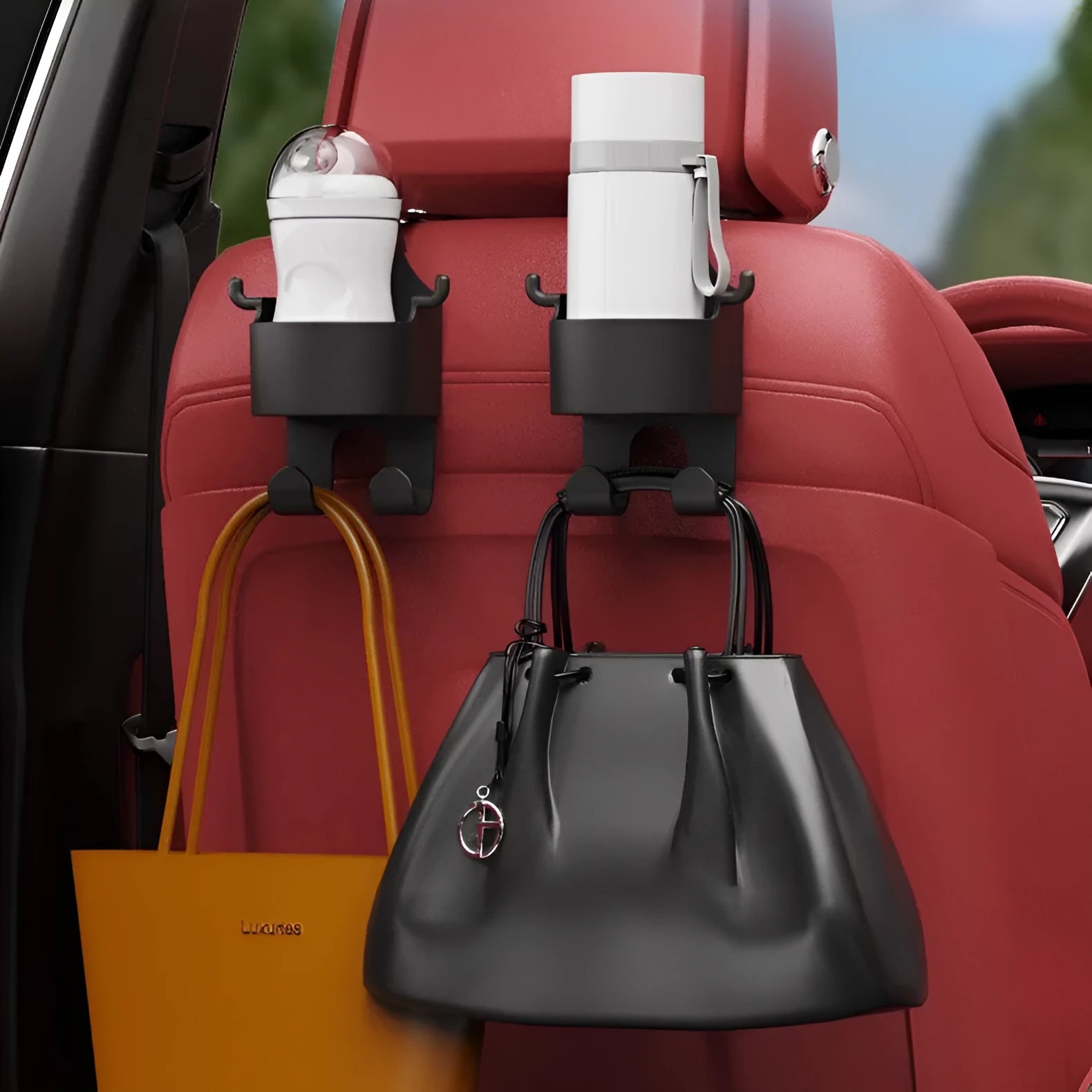 Black plastic car seat back organiser with cup holder and hook, shown from the side.