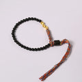 Hand-woven obsidian bracelet strap showing textured detail and 4mm width