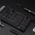 Black solid colour oxford cloth portable outdoor organiser bag with 18cm by 3.5cm dimensions.