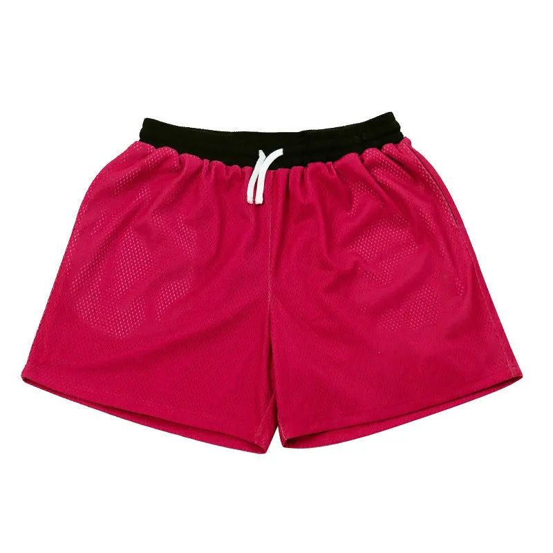Men's solid-colour mesh quick-drying shorts in chemical fibre fabric for athletic use