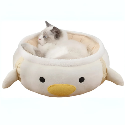 Green dinosaur and chick shaped cat bed shown both flat and hanging as a hammock