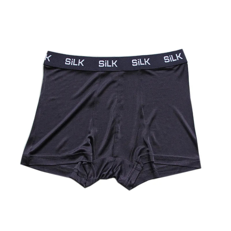 Men's loose fit silk shorts in navy blue colour showing mid waist design