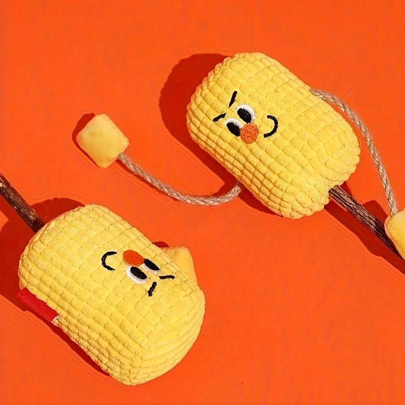 Natural wood corn cob shaped chew toy for cats on a white background.
