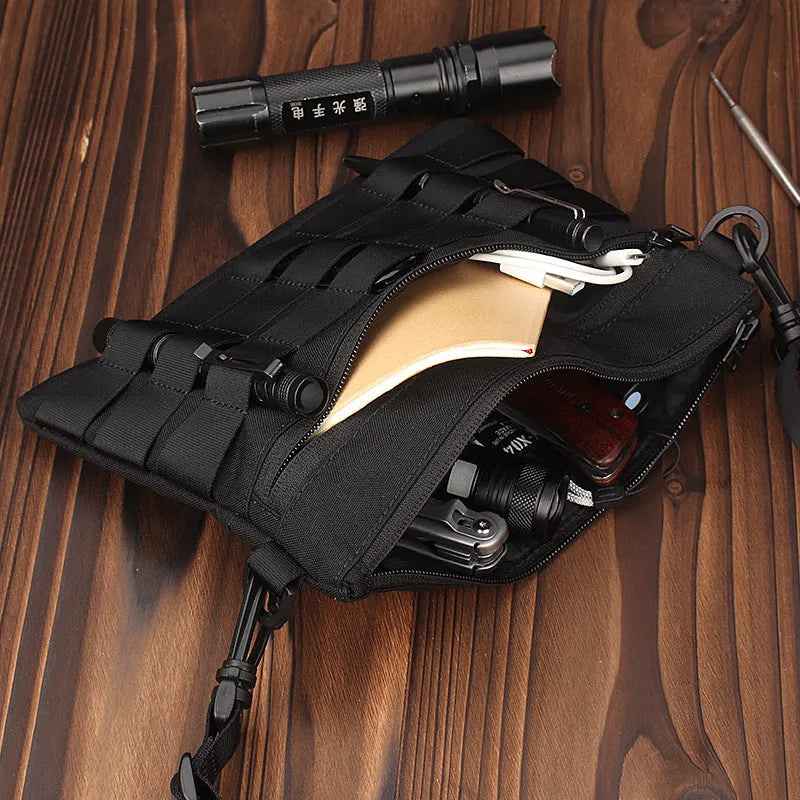 Black solid colour oxford cloth portable outdoor organiser bag with 18cm by 3.5cm dimensions.