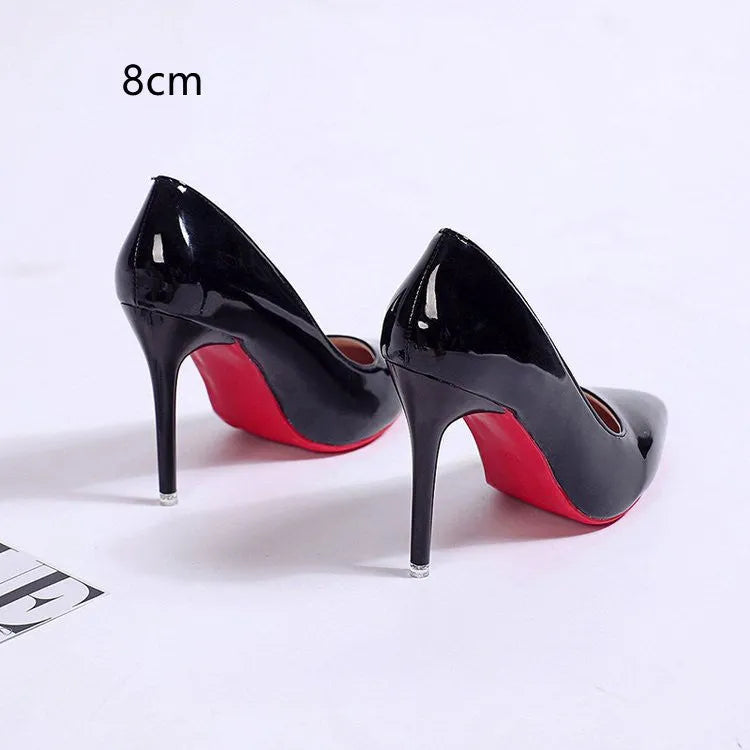 Women's solid colour stiletto heel pump with pointed toe and shallow mouth cut on a rubber sole.