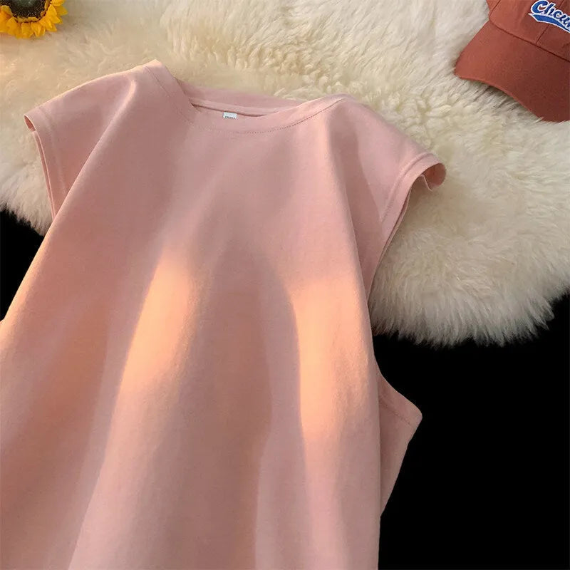 Men's loose solid colour cotton tank top sleeveless t-shirt on a hanger.
