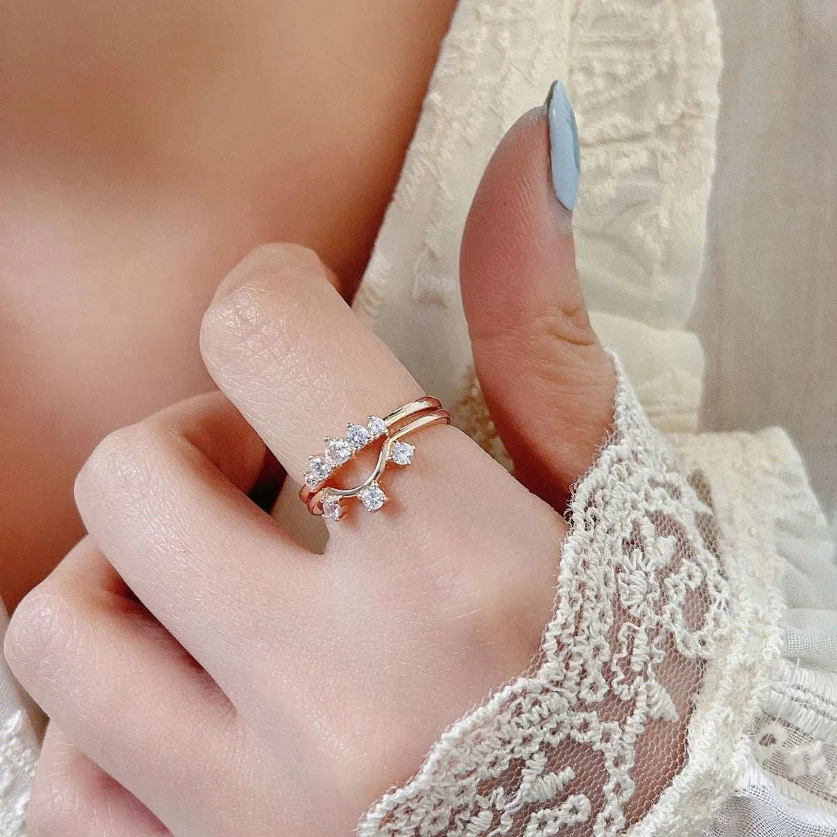 Silver multi-layer moonstone rose gold ring set of 3 on display, unisex geometric style