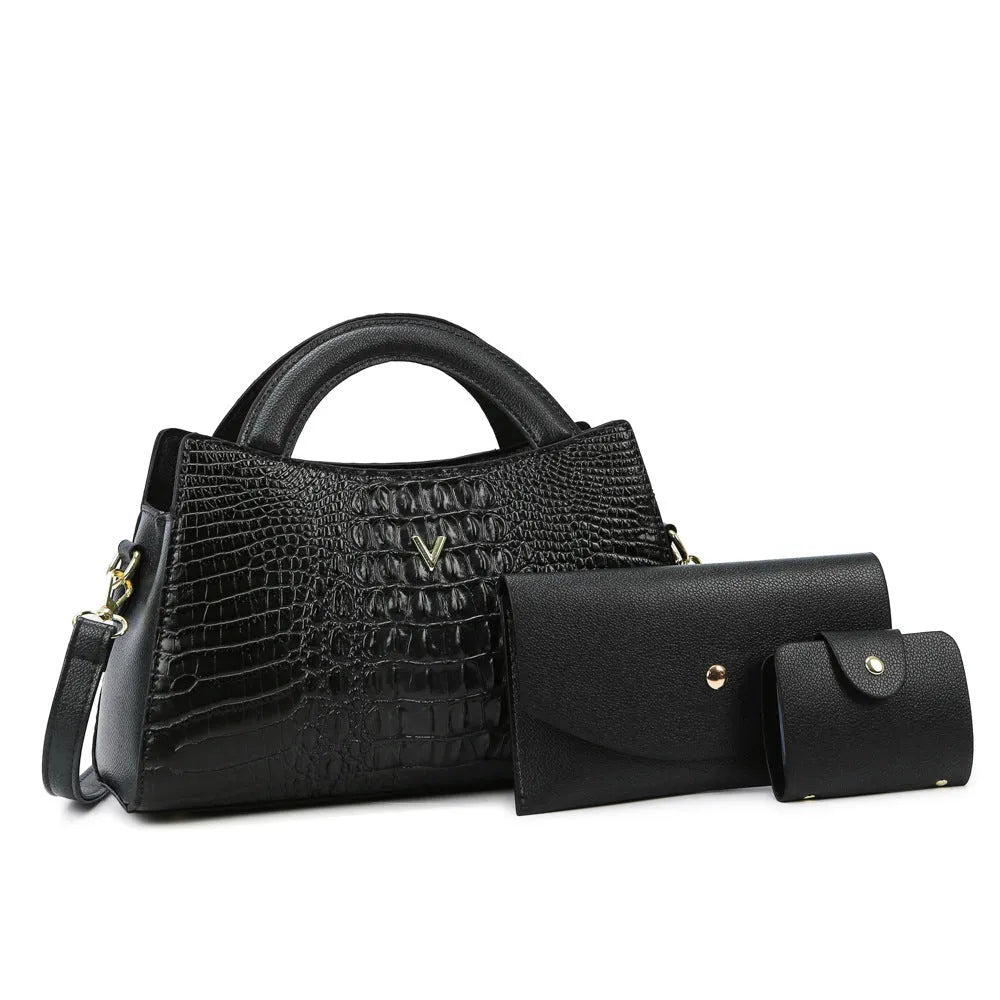 Women's black crocodile pattern PU leather crossbody bag with a single strap and front sandwich pocket.