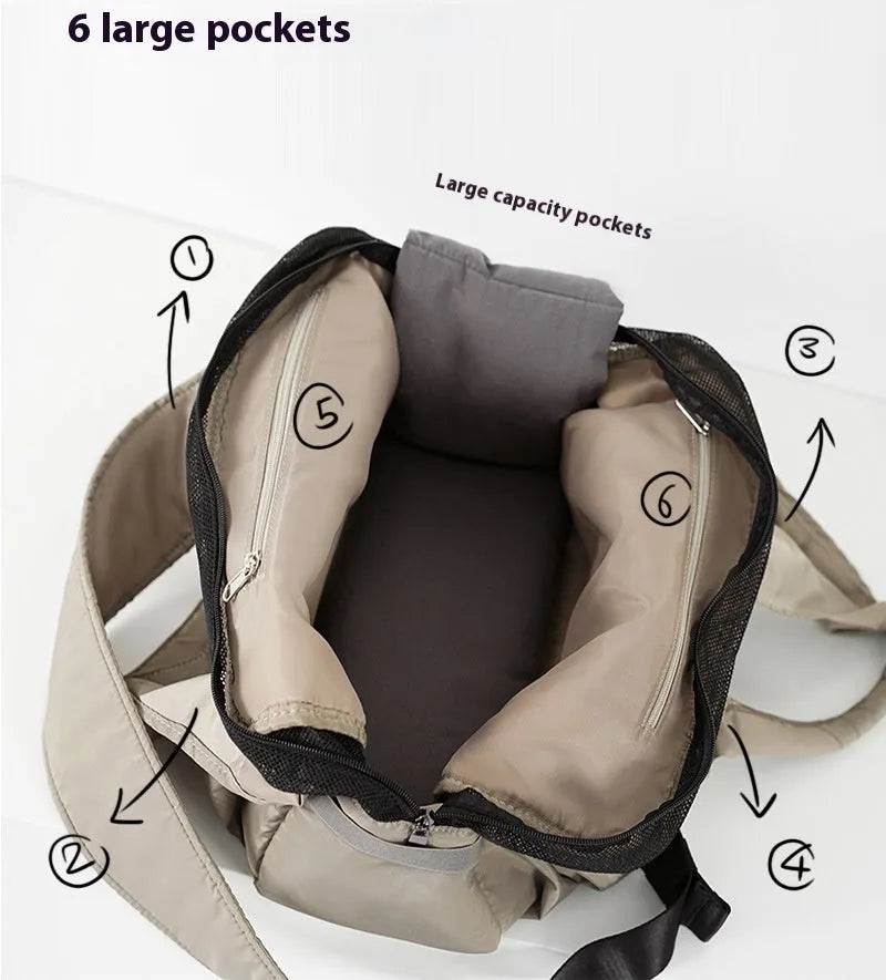 Apricot coloured cloth pet handbag carrier with dimensions 41 cm by 16 cm by 28 cm.