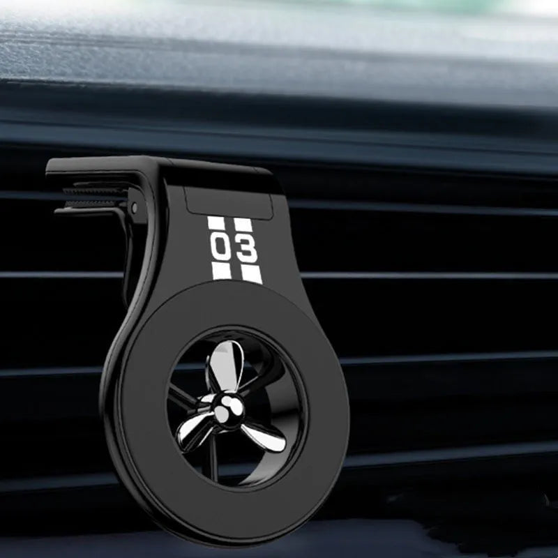 Magnetic car air vent phone holder with adjustable paddle in black colour showing smartphone attached