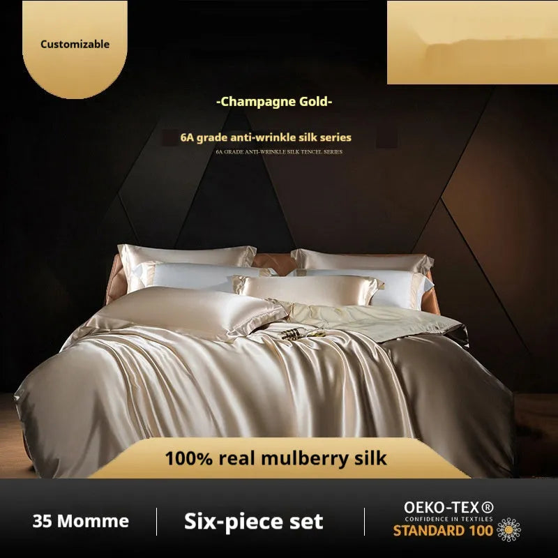 Silk four-piece quilt cover set in a solid colour, shown in a bedroom setting on a bed.