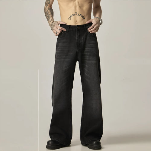 Black retro straight-leg jeans with zip fly opening and loose fit on size chart