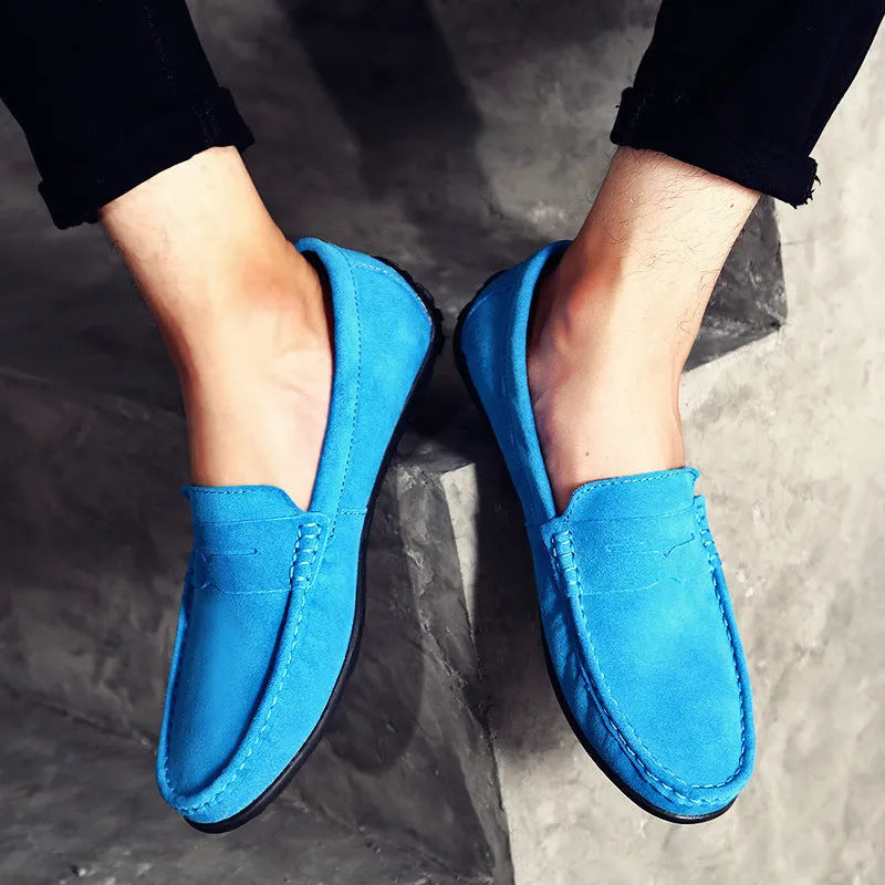 Men's brown suede leather casual shoes with round toe and flat rubber sole on a white background
