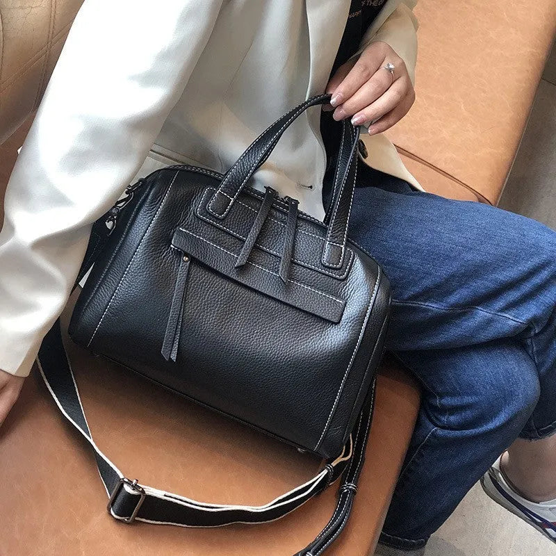 Genuine cowhide leather men's messenger bag in horizontal square shape with lychee pattern.
