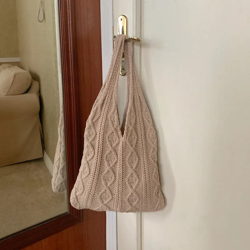 Retro style hollow knitted women's tote bag in a solid colour with double shoulder straps