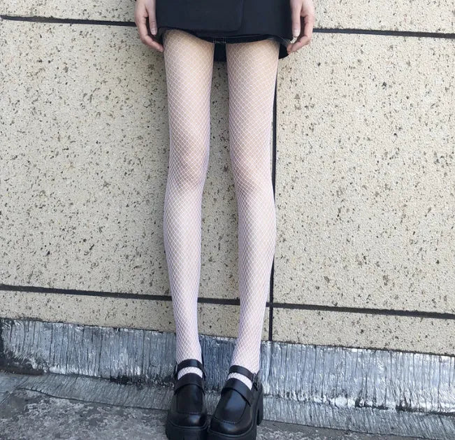 Women's black and white mesh pattern tights showing large, medium, and small net designs for summer.