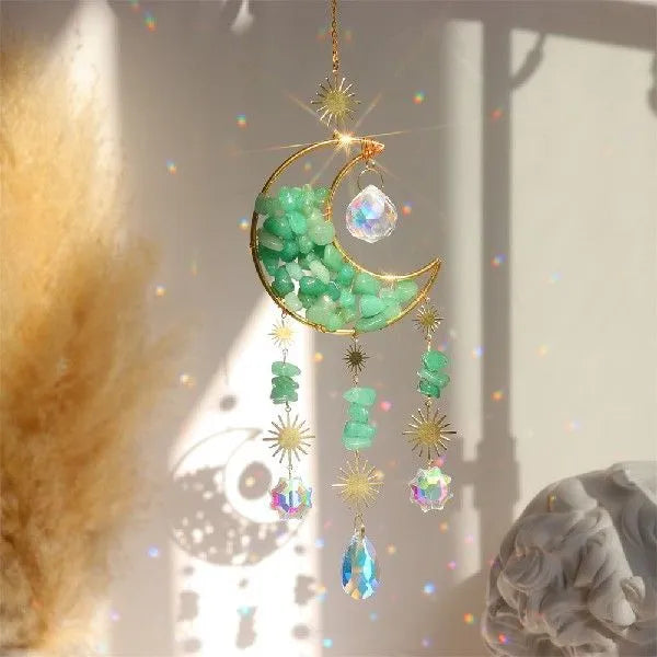 K9 crystal moon pendant hanging from a car rear-view mirror in sky blue colour