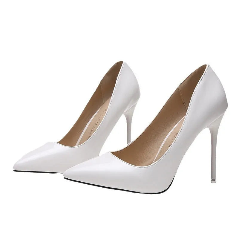 Women's stiletto heel pumps in apricot colour with pointed toe and buckle detail
