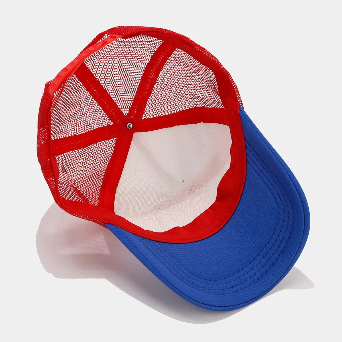 Red and blue contrast colour baseball cap with mesh fabric and adjustable strap