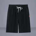 Cotton-linen blend cropped pants in a solid colour with a drawstring waist, shown in a mid-length cut.