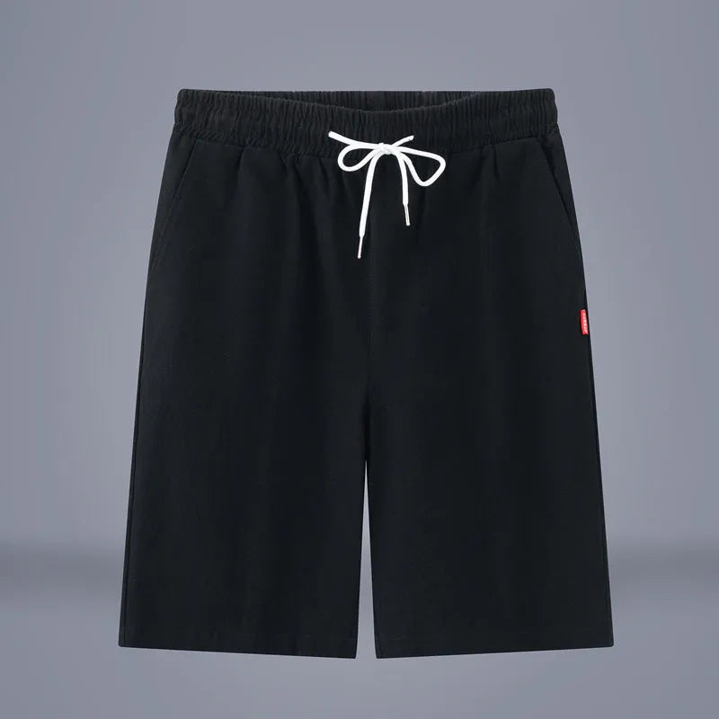 Cotton-linen blend cropped pants in a solid colour with a drawstring waist, shown in a mid-length cut.
