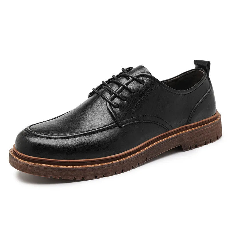 Casual leather shoes in black with round toe, low top design, and visible sewing line detailing