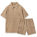 Women's beige elastic waist shorts and short sleeve top two-piece casual set laid flat.