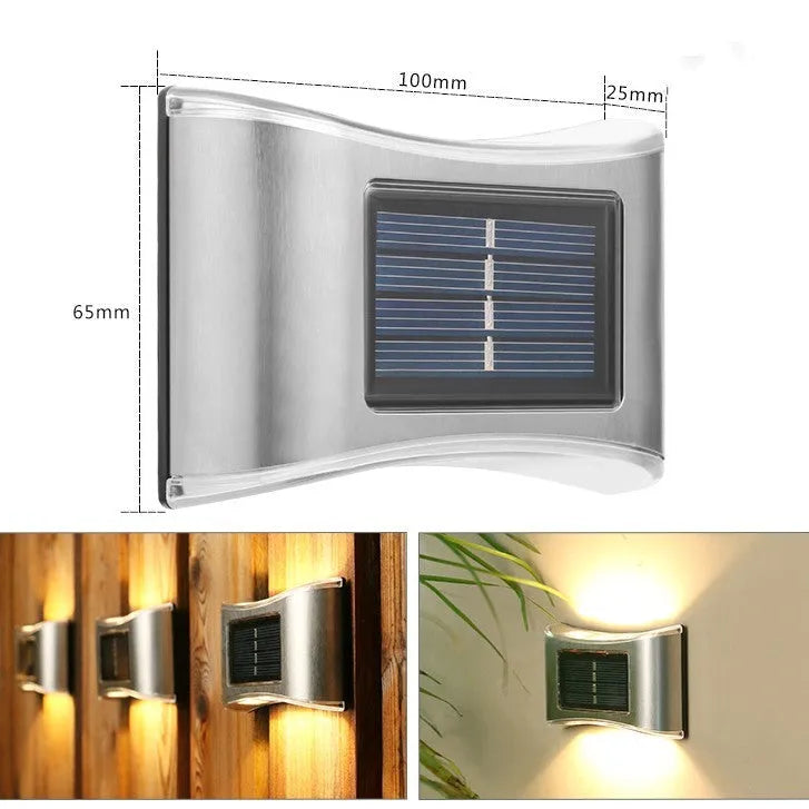 Solar garden wall light with upward and downward LED illumination for outdoor decorative lighting