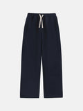 Men's black fleece-lined sweatpants with elastic drawstring waist in loose fit trousers design