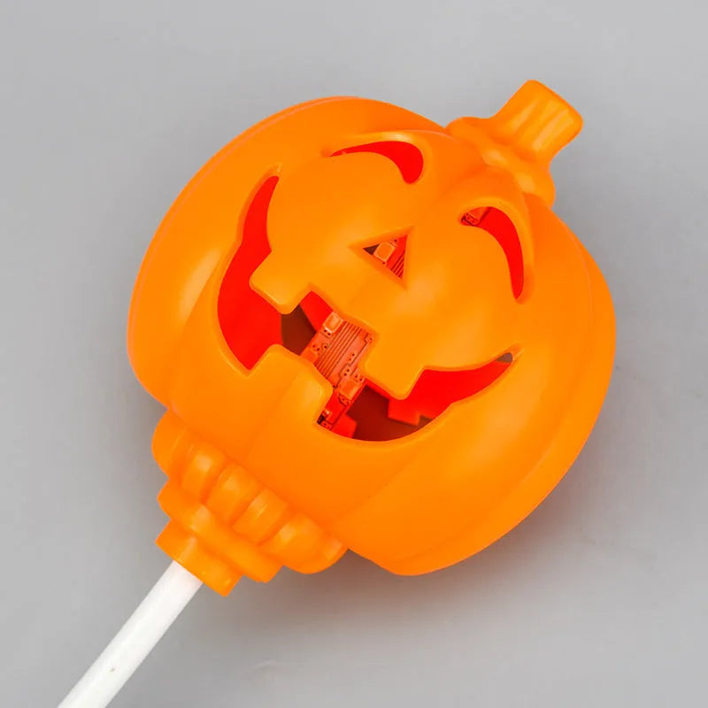 Plastic pumpkin lamp with USB charging cable in yellow or purple light colour