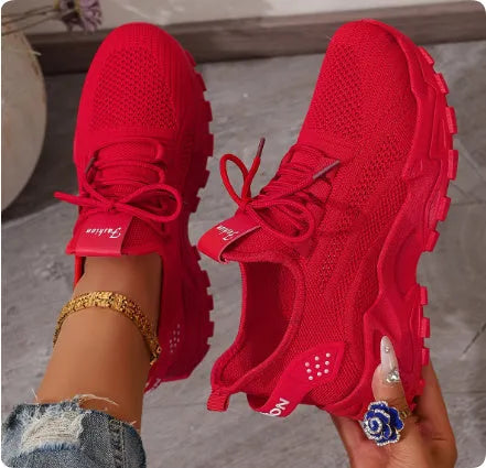 Women's low-top mesh sneakers in various colours with a platform sole and front lace-up design.