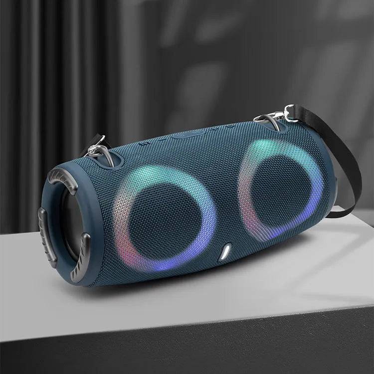 War Drum portable Bluetooth speaker with RGB lights in camouflage colour with carrying strap.