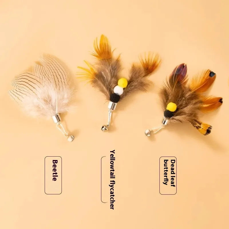 Three steel wire cat toy replacement heads with small flying insect designs in assorted colours