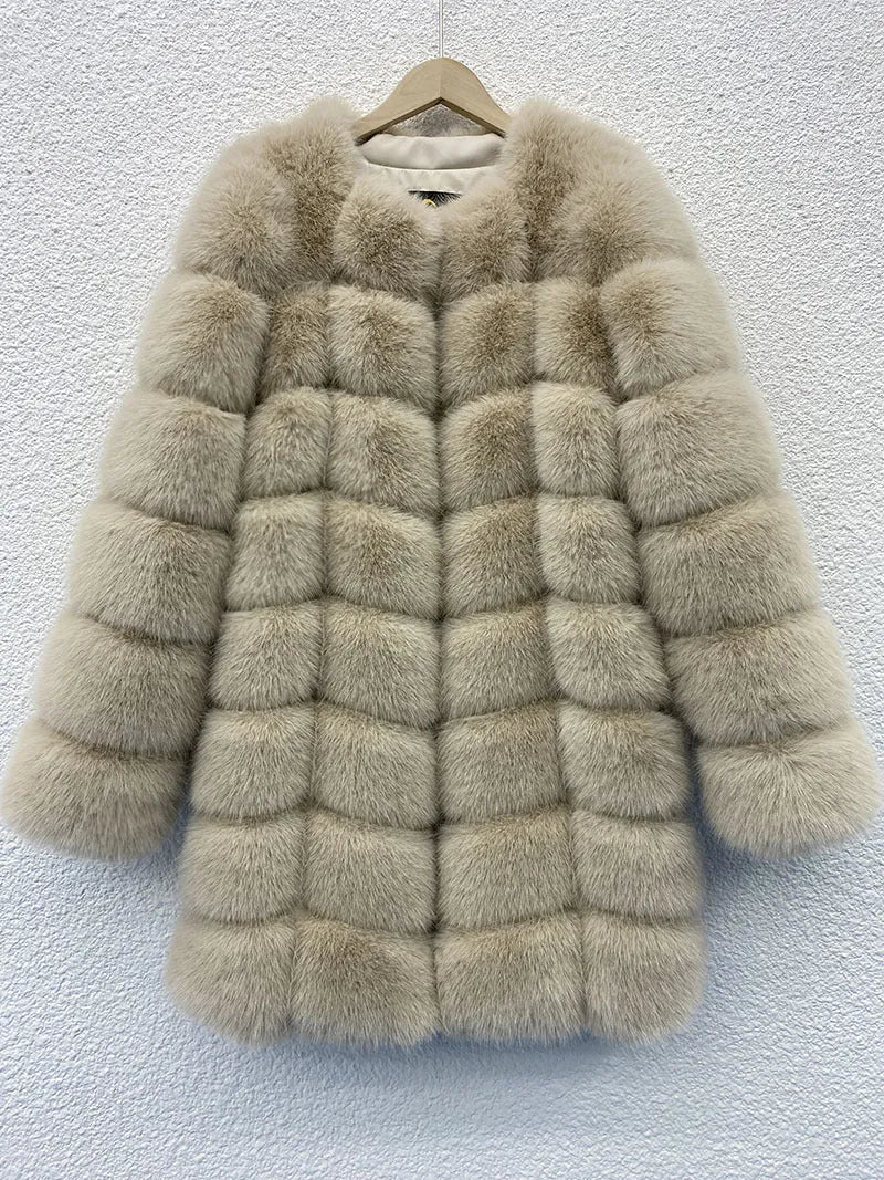 Women's long black artificial fur coat with regular sleeves on a hanger.