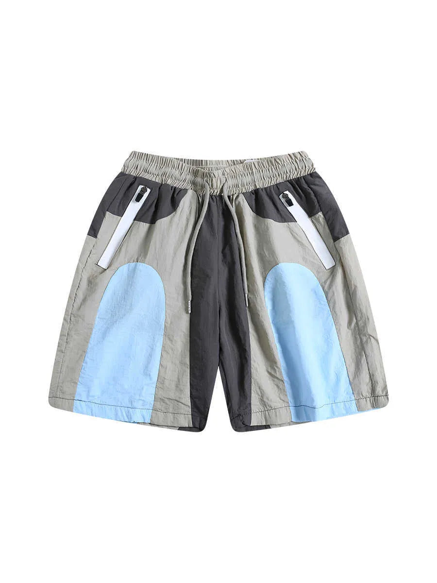 Blue patchwork quick-drying outdoor shorts with loose straight-leg design and elastic waistband