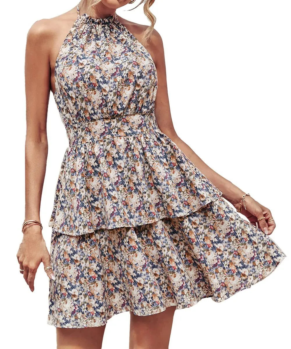 Women's boho-style backless halter dress with ruffled A-line skirt in a printed pattern.